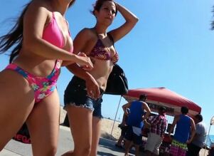 Candid latina in bathing suit with..